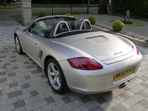 Silver grey metallic with colour co-ordinated roll-over bars and wing mirrors