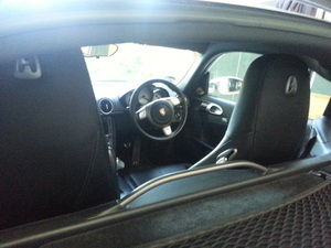 Full black leather immaculate interior of Porsche Cayman.