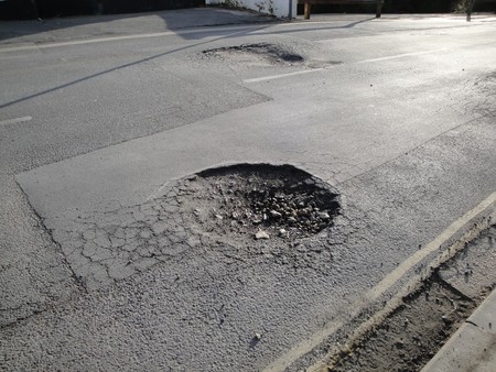 Hitting a pothole is a common cause of misalignment.
